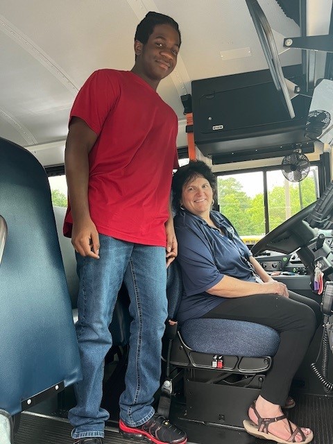 Student on Bus with Driver